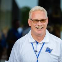 Guest laughing at the Jamie Hosford Football Center dedication.